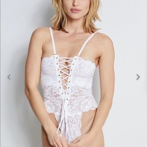 Reversible body suit